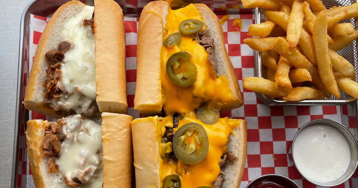 Chubby’s cheesesteaks with melted cheese, jalapeños, and golden fries