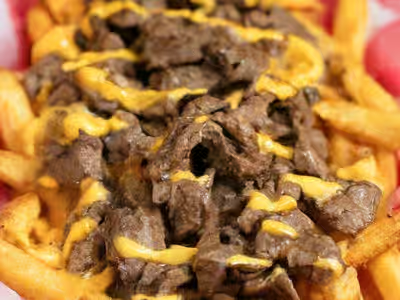 Chubby’s cheesesteak fries with ribeye steak and cheese sauce